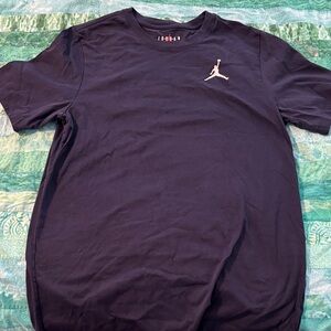 Jordan Men's Navy Blue Tee with White Logo
Size large, worn once